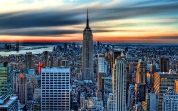 the empire state building against the backdrop of the sunset sky, cities, city, cityscape, cityscapes, clouds, evening, evenings, twilight, dus, new york, rivers, canals, streams, sky, skyscrapers, sunsets, sunset, usa, united states, architecture, world
