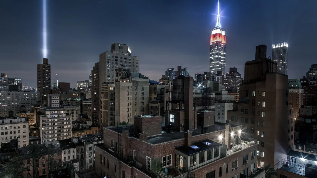The Empire State Building illuminated against the night sky of New York City