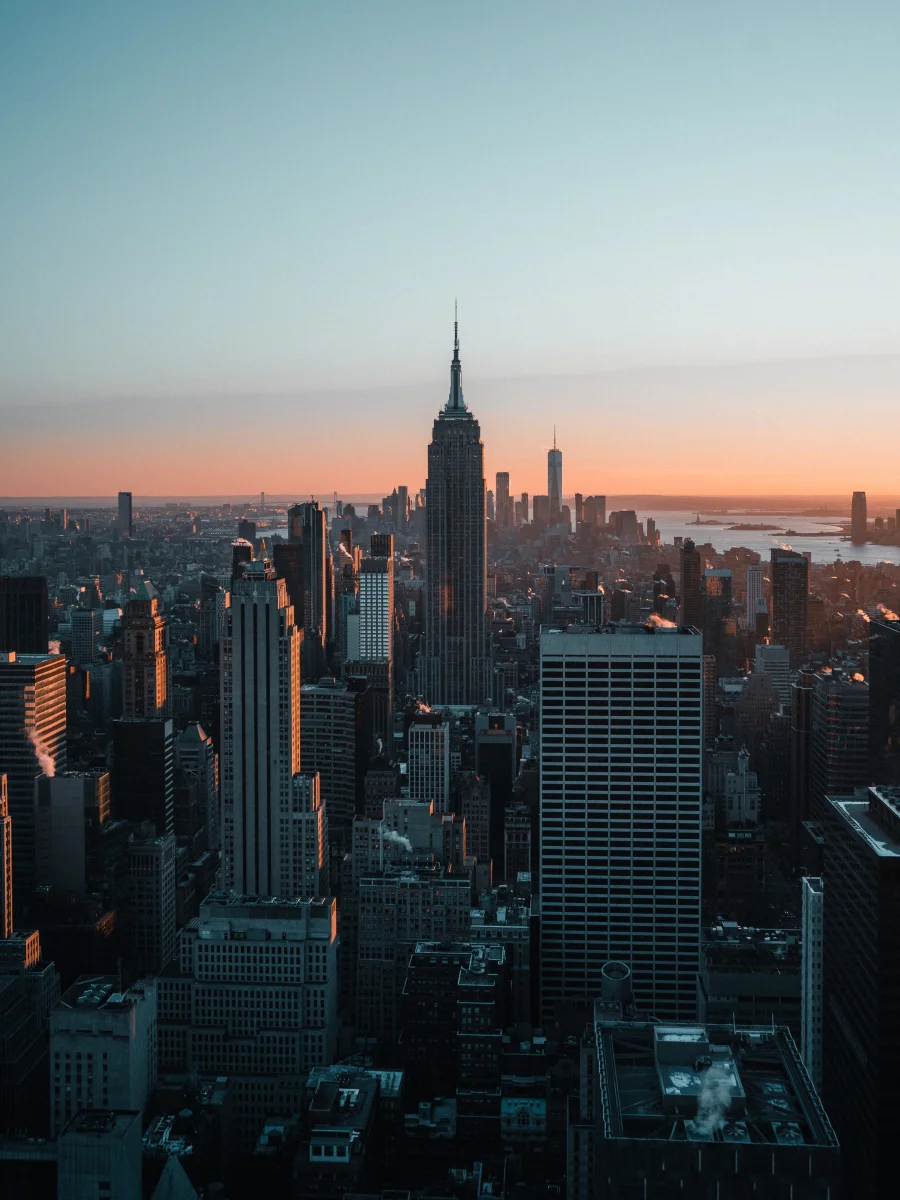 The Empire State Building bathed in the rays of the rising sun