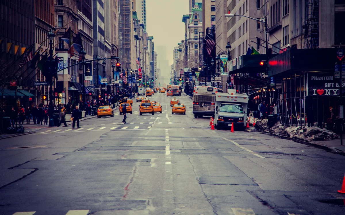 Yellow taxis on a bustling New York City street