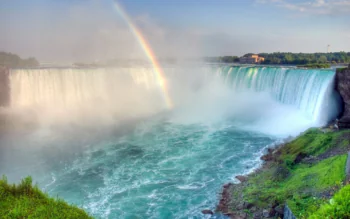 A rainbow over the cascades of Niagara Falls in Canada