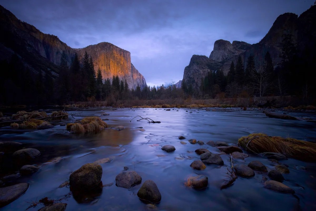 The golden light of sunset on the cliffs of El Capitan