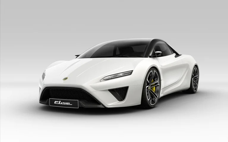 A snow-white Lotus Elise under studio lighting