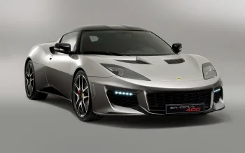 A silver Lotus Evora 400 under studio lighting