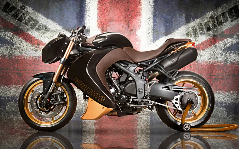 A custom Triumph Speed Triple Bulldog against the backdrop of the British flag