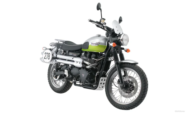 A silver-green Triumph Scrambler 900 against a white background