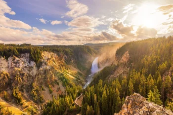 the lower falls in yellowstone canyon, canyons, cliffs, clouds, fir trees, coniferous trees, forest, forests, landscapes, mountains, peaks, hills, nature reserves, wildlife reserves, parks, national parks, rivers, canals, streams, sun, sun rays, sunlight, rays, sunsets, sunset, usa, united states, waterfalls, yellowstone, nature, world