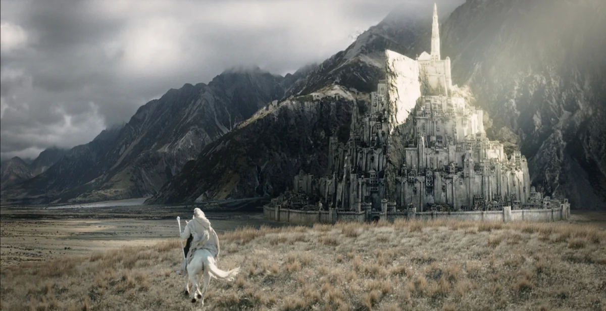 gandalf, riding on spolokh, approaches the fortress of minas tirith, the lord of the rings: the return of the king, castles, cinema, fantasy, fortresses, horses, ian mckellen, riders, the lord of the rings, valleys, movies