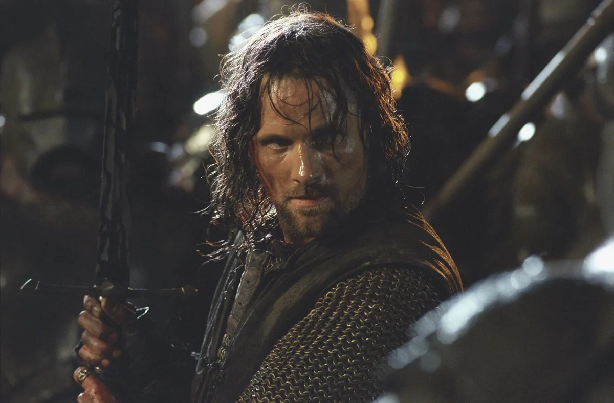 Aragorn, sword in hand, in the thick of the night battle
